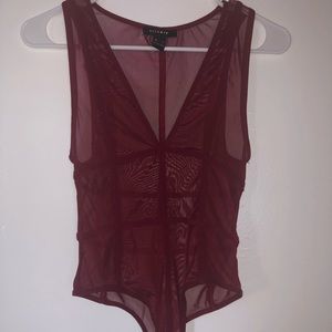 Sheer maroon body suit